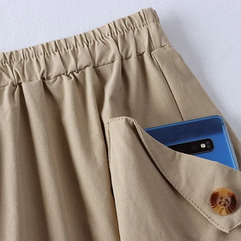 Jupe midi évasée à poches et taille élastique