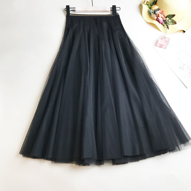 Jupe en tulle vaporeuse mi-longue ajustée à taille élastique
